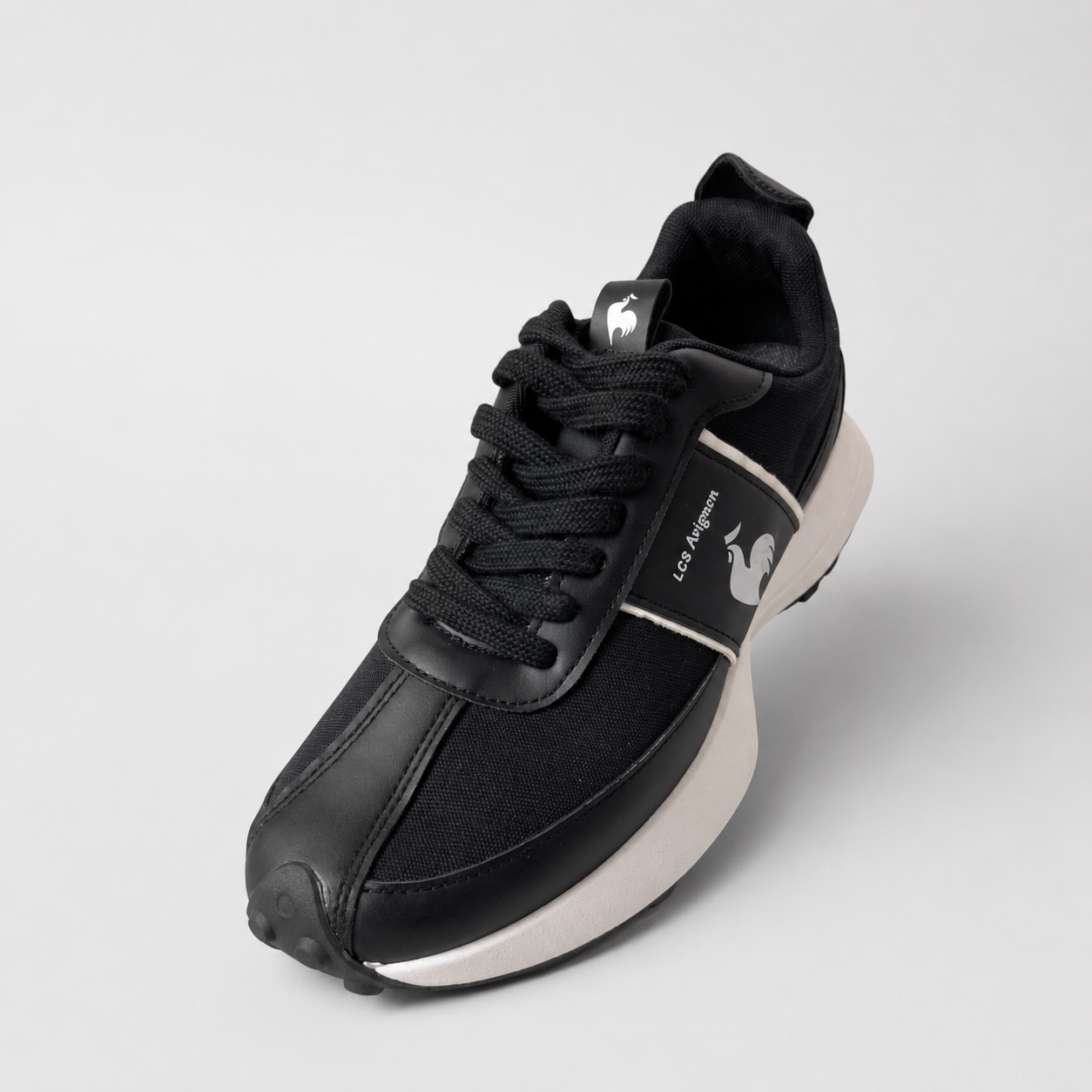 Le Coq Sportif black sneaker front angle