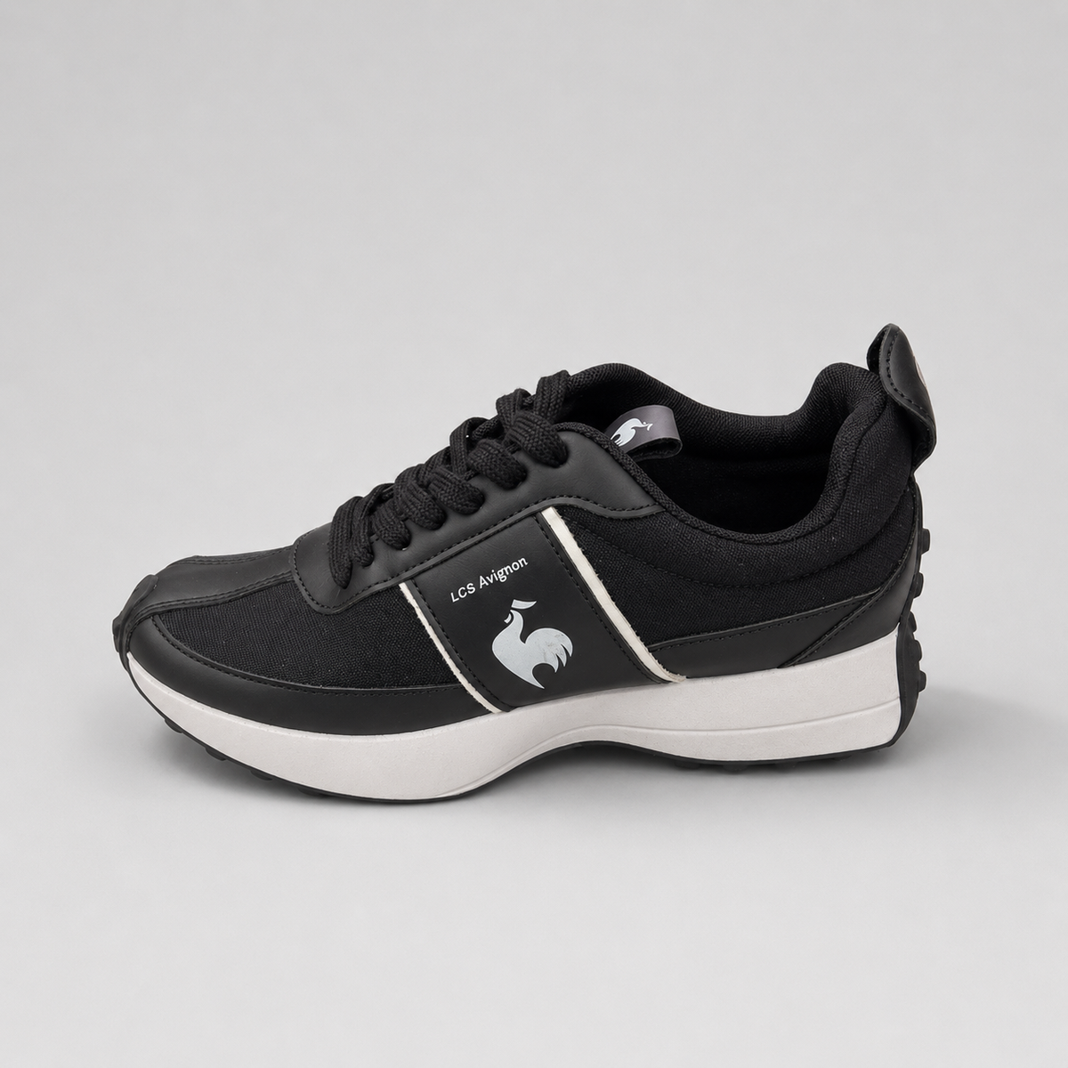 Le Coq Sportif black sneaker side view