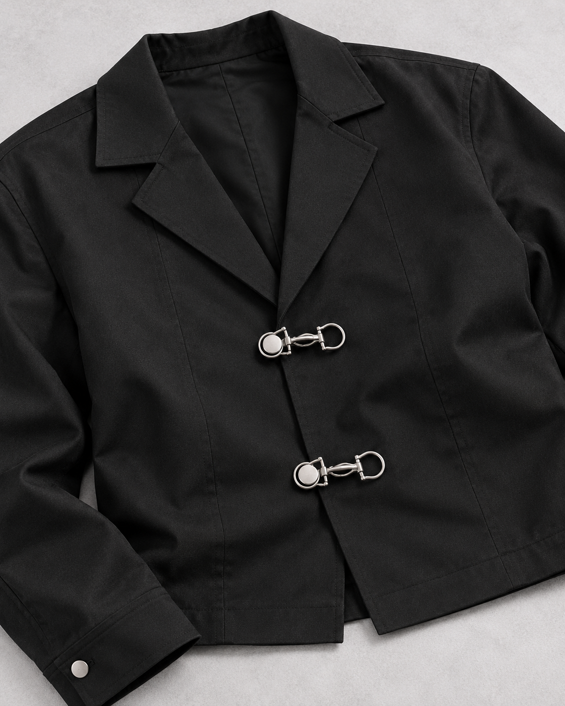 Soft Classic fabric, lapel and silver clasp detail